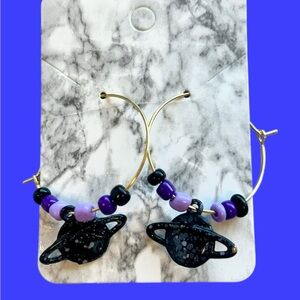 Unique handmade space hoop earrings.